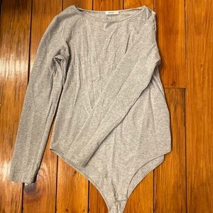 Long sleeve body suit.